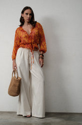 SHEER TIE-UP RUFFLE TOP