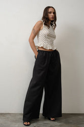 PEPLUM TOP WITH SHOULDER TIE DETAIL